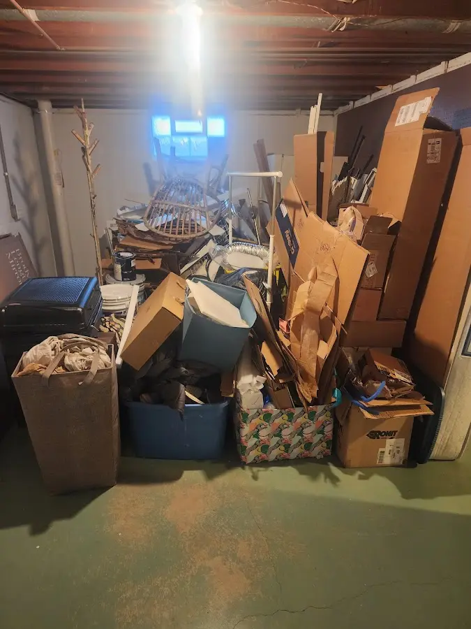 Roll-off dumpster container at job site for Yard Waste Dumpster Rental in Chelsea